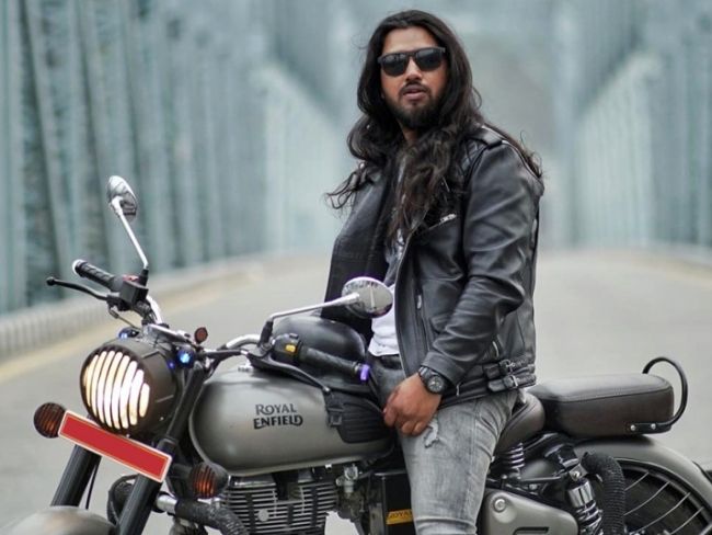Sisan Baniya on Bike